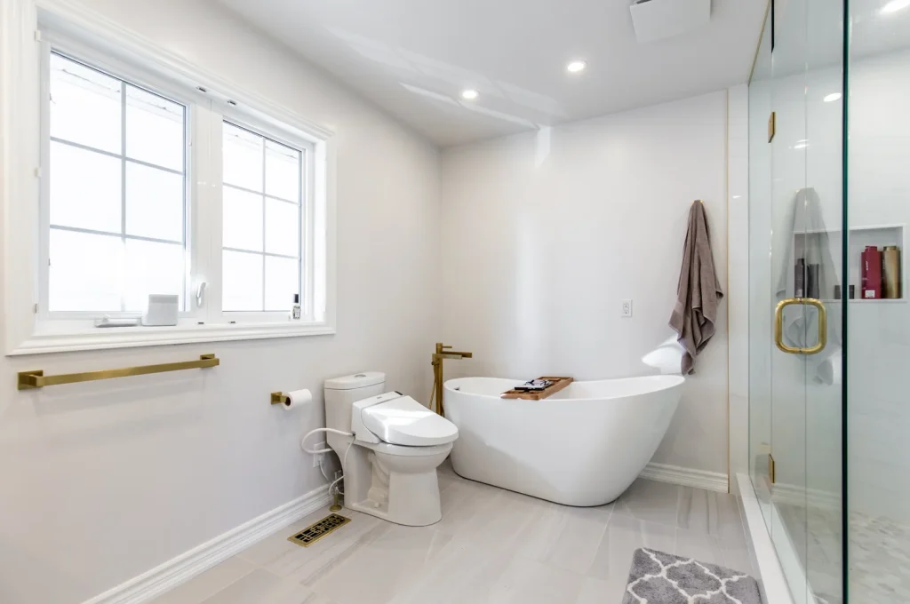 Photo of bathroom with freestanding tub and glass shower bathroom renovation Photo of bathroom with freestanding tub and glass shower bathroom renovation